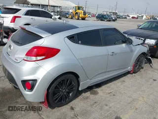 2016 Hyundai Veloster Turbo with VIN KMHTC6AE3GU263387, listed as a IAAI auction lot 42040177 with 96,864 mi miles. Bid and sale history available at carsss.com. Image 4.
