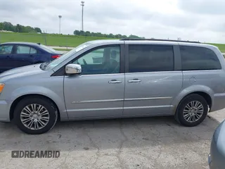 2014 Chrysler Town & Country Touring-L with VIN 2C4RC1CG2ER107917, listed as a IAAI auction lot 42180194 with 169,447 mi miles. Bid and sale history available at carsss.com. Image 14.