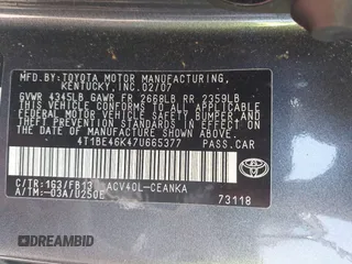 2007 Toyota Camry CE with VIN 4T1BE46K47U665377, listed as a IAAI auction lot 42133285 with 157,396 mi miles. Bid and sale history available at carsss.com. Image 9.