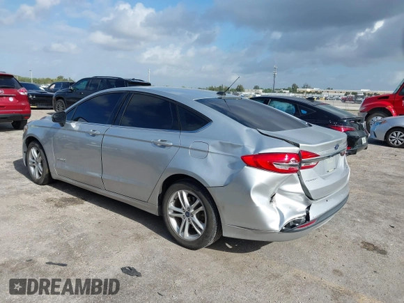 2018 Ford Fusion SE z VIN 3FA6P0LU2JR281231, wystawiony jako IAAI lot #41963083 z przebiegiem 115 434 mil mil oraz . Historia ofert i sprzedaży dostępna na DreamBid. Obrazek 3.