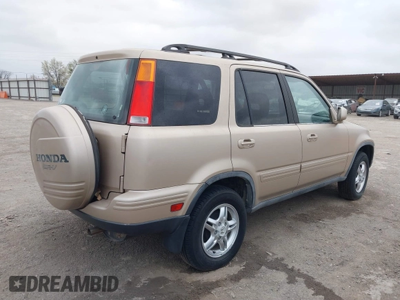 2001 Honda CR-V SE with VIN JHLRD187X1S005637, listed as a IAAI auction lot 41838916 with 153,388 mi miles. Bid and sale history available at carsss.com. Image 4.