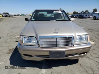 2000 Mercedes-Benz C 230 Kompressor with VIN WDBHA24G5YA826317, listed as a Copart auction lot 69146854 with 103,928 mi miles and Salvage Title. Bid and sale history available at carsss.com. Image 5.