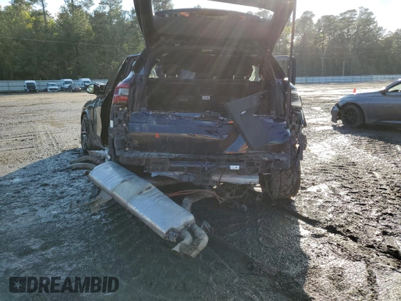 2020 BMW X5 M50i with VIN 5UXJU4C05LLE45415, listed as a Copart auction lot 80190304 with Not Provided miles and Salvage Title. Bid and sale history available at DreamBid. Image 6.