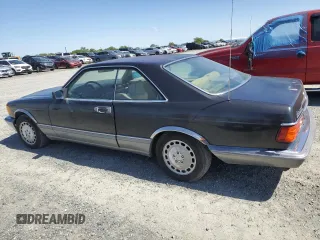 1987 Mercedes-Benz 560 with VIN WDBCA45D3HA358923, listed as a Copart auction lot 52143895 with 127,974 mi miles and Clean Title. Bid and sale history available at DreamBid. Image 2.