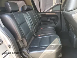 2009 Nissan Armada LE z VIN 5N1BA08C99N601407, wystawiony jako Copart lot #53129625 z przebiegiem 270 739 mil mil oraz Czysty tytuł • Clean title. Historia ofert i sprzedaży dostępna na DreamBid. Obrazek 11.