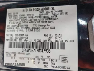 2014 Ford Fusion SE with VIN 3FA6P0H71ER317936, listed as a IAAI auction lot 42119522 with 206,220 mi miles. Bid and sale history available at carsss.com. Image 9.