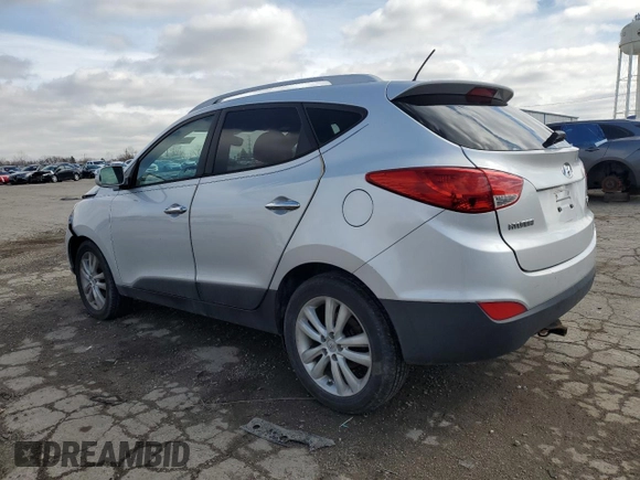 2011 Hyundai Tucson Limited with VIN KM8JUCAC3BU292348, listed as a Copart auction lot 50919925 with 184,505 mi miles and Salvage Title. Bid and sale history available at DreamBid. Image 2.