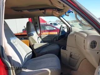 1999 Chevrolet Astro with VIN 1GNEL19W6XB104010, listed as a IAAI auction lot 41403240 with 96,904 mi miles. Bid and sale history available at carsss.com. Image 5.