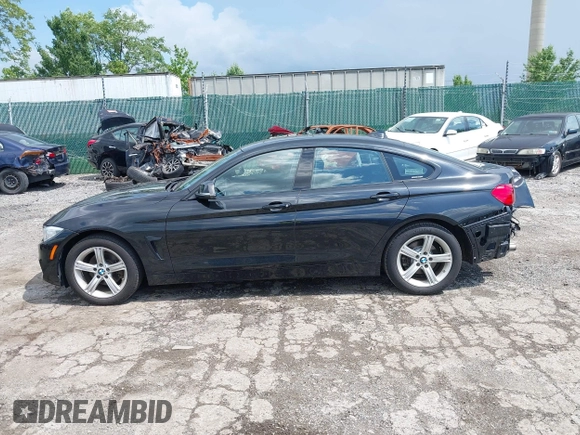 2015 BMW 4 Series 428i xDrive with VIN WBA4C9C52FD331620, listed as a IAAI auction lot 42556526 with 115,674 mi miles and . Bid and sale history available at DreamBid. Image 15.