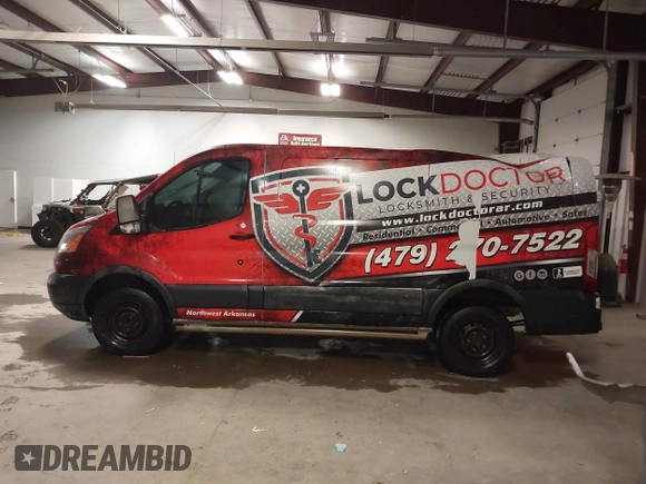 2015 Ford Transit Cargo with VIN 1FTNR1ZM3FKA77580, listed as a IAAI auction lot 41298569 with 187,683 mi miles and . Bid and sale history available at DreamBid. Image 14.