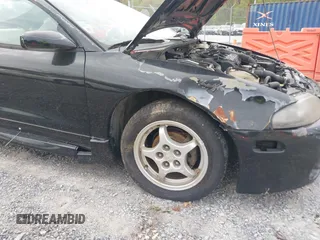 1997 Mitsubishi Eclipse with VIN 4A3AK44Y1VE042951, listed as a IAAI auction lot 42103920 with 119,268 mi miles and . Bid and sale history available at DreamBid. Image 6.