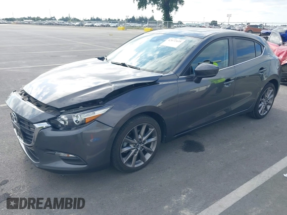 2018 Mazda 3 Touring with VIN 3MZBN1L32JM268582, listed as a IAAI auction lot 42072435 with 61,417 mi miles. Bid and sale history available at carsss.com. Image 17.