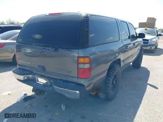 2000 Chevrolet Suburban LS with VIN 3GNEC16T2YG104878, listed as a IAAI auction lot 40464441 with 233,868 mi miles. Bid and sale history available at carsss.com. Image 4.