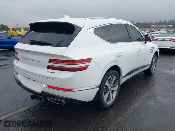 2021 Genesis GV80 with VIN KMUHCESC2MU052594, listed as a IAAI auction lot 41273763 with 19,190 mi miles and . Bid and sale history available at DreamBid. Image 4.