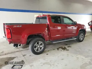 2020 Chevrolet Colorado 4WD Z71 z VIN 1GCGTDENXL1111901, wystawiony jako Copart lot #57093195 z przebiegiem 60 992 mil mil oraz Szkoda całkowita • Salvage title. Historia ofert i sprzedaży dostępna na DreamBid. Obrazek 3.