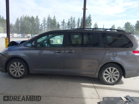 2014 Toyota Sienna Limited z VIN 5TDDK3DC9ES088584, wystawiony jako IAAI lot #42333016 z przebiegiem 115 138 mil mil oraz . Historia ofert i sprzedaży dostępna na DreamBid. Obrazek 14.