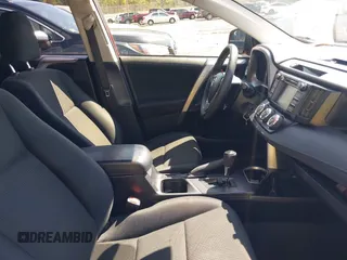 2018 Toyota RAV4 LE with VIN JTMBFREV2JD228186, listed as a IAAI auction lot 42076730 with 93,899 mi miles. Bid and sale history available at carsss.com. Image 5.