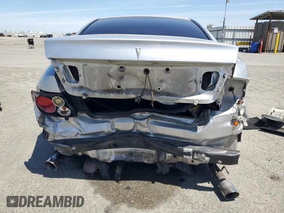 2006 Pontiac GTO z VIN 6G2VX12U16L565993, wystawiony jako Copart lot #57291015 z przebiegiem 190 257 mil mil oraz Szkoda całkowita • Salvage title. Historia ofert i sprzedaży dostępna na DreamBid. Obrazek 6.