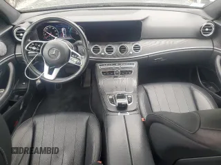 2019 Mercedes-Benz E 300 with VIN WDDZF4KB7KA553856, listed as a Copart auction lot 61025735 with 59,001 mi miles and Salvage title. Bid and sale history available at DreamBid. Image 8.