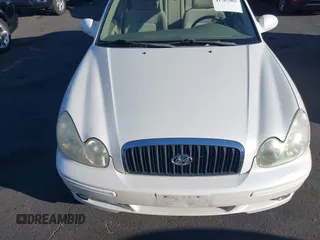 2004 Hyundai Sonata with VIN KMHWF25S84A016263, listed as a IAAI auction lot 41767003 with 140,301 mi miles. Bid and sale history available at carsss.com. Image 6.