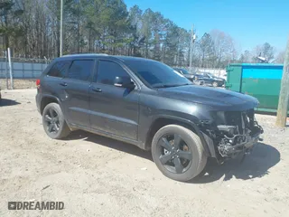 2014 Jeep Grand Cherokee Overland with VIN 1C4RJFCT5EC105880, listed as a IAAI auction lot 41701105 with 169,930 mi miles. Bid and sale history available at carsss.com. Image 1.