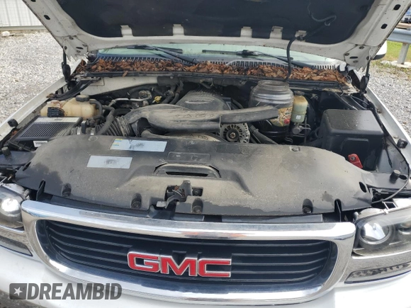2002 GMC Yukon SLT z VIN 1GKEC13Z72R130454, wystawiony jako Copart lot #53845705 z przebiegiem 237 483 mil mil oraz Szkoda całkowita • Salvage title. Historia ofert i sprzedaży dostępna na DreamBid. Obrazek 12.