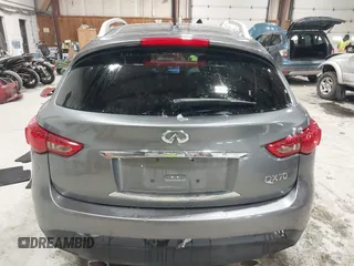 2017 Infiniti QX70 z VIN JN8CS1MU3HM143799, wystawiony jako IAAI lot #41554527 z przebiegiem 70 453 mil mil oraz . Historia ofert i sprzedaży dostępna na DreamBid. Obrazek 16.
