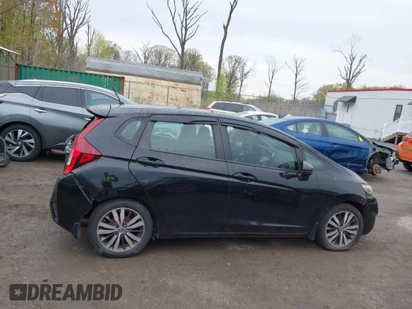 2015 Honda Fit EX-L with VIN 3HGGK5H88FM726406, listed as a IAAI auction lot 42033501 with 124,216 mi miles. Bid and sale history available at carsss.com. Image 13.