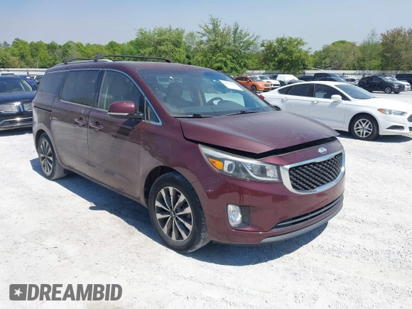2015 Kia Sedona EX with VIN KNDMC5C19F6018139, listed as a IAAI auction lot 42031165 with 136,484 mi miles. Bid and sale history available at carsss.com. Image 1.
