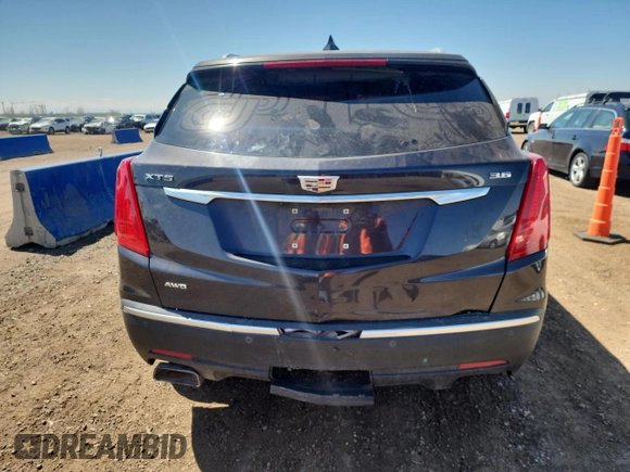 2017 Cadillac XT5 Premium Luxury AWD z VIN 1GYKNERS6HZ218926, wystawiony jako Copart lot #53151465 z przebiegiem 87 244 mil mil oraz Szkody całkowita. Historia ofert i sprzedaży dostępna na DreamBid. Obrazek 6.