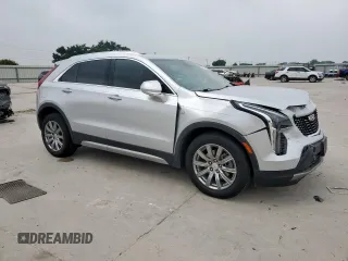 2020 Cadillac XT4 FWD Premium Luxury z VIN 1GYFZCR42LF115413, wystawiony jako Copart lot #56746785 z przebiegiem 41 296 mil mil oraz Szkody całkowita. Historia ofert i sprzedaży dostępna na DreamBid. Obrazek 4.