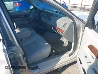 2004 Mercury Grand Marquis GS with VIN 2MEFM74W34X677247, listed as a IAAI auction lot 41856970 with 135,225 mi miles and . Bid and sale history available at DreamBid. Image 5.