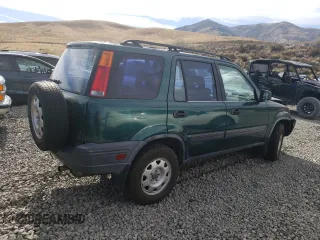 1999 Honda CR-V LX with VIN JHLRD1847XC036630, listed as a Copart auction lot 75708664 with 201,240 mi miles and Salvage Title. Bid and sale history available at carsss.com. Image 3.