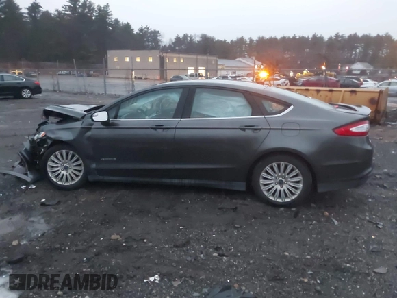 2015 Ford Fusion S Hybrid with VIN 3FA6P0UU2FR102241, listed as a IAAI auction lot 41003479 with 88,020 mi miles. Bid and sale history available at carsss.com. Image 13.