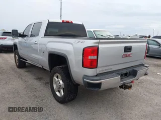 2016 GMC Sierra 2500HD SLT z VIN 1GT12TE89GF183548, wystawiony jako IAAI lot #40476400 z przebiegiem 203 148 mil mil oraz . Historia ofert i sprzedaży dostępna na DreamBid. Obrazek 3.