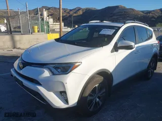 2018 Toyota RAV4 XLE with VIN JTMRFREV0JJ735636, listed as a IAAI auction lot 41658305 with 94,944 mi miles. Bid and sale history available at carsss.com. Image 17.