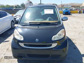 2008 Smart fortwo Pure with VIN WMEEJ31X78K180398, listed as a IAAI auction lot 42193886 with 98,136 mi miles and . Bid and sale history available at DreamBid. Image 6.