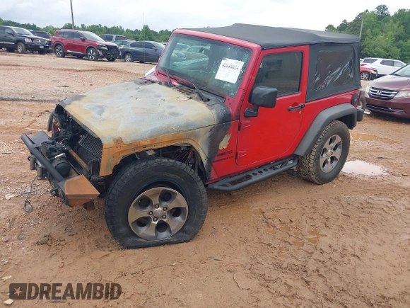 2014 Jeep Wrangler Sport с VIN 1C4AJWAGXEL107854, выставлен на аукционе IAAI как лот 42648024 с пробегом Не указан миль и . История ставок и продаж доступна на DreamBid. Изображение 2.