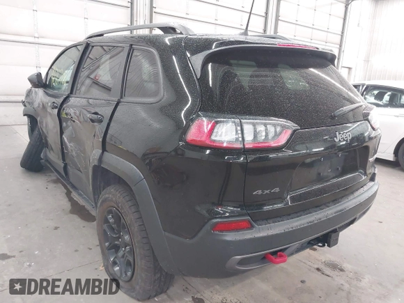 2019 Jeep Cherokee Trailhawk with VIN 1C4PJMBX9KD456748, listed as a IAAI auction lot 42367186 with 91,665 mi miles and . Bid and sale history available at DreamBid. Image 3.