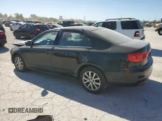 2013 Volkswagen Jetta SE with VIN 3VWDX7AJ0DM269550, listed as a Copart auction lot 74886184 with 130,181 mi miles and Salvage title. Bid and sale history available at DreamBid. Image 2.