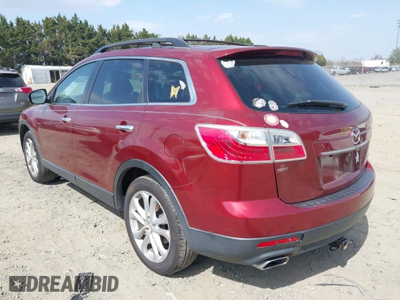 2012 Mazda CX-9 Grand Touring z VIN JM3TB3DV0C0340646, wystawiony jako IAAI lot #41854513 z przebiegiem 179 180 mil mil oraz . Historia ofert i sprzedaży dostępna na DreamBid. Obrazek 3.