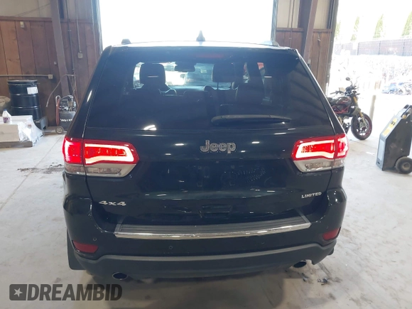 2014 Jeep Grand Cherokee Limited z VIN 1C4RJFBG2EC320282, wystawiony jako IAAI lot #42067273 z przebiegiem 78 061 mil mil oraz . Historia ofert i sprzedaży dostępna na DreamBid. Obrazek 16.