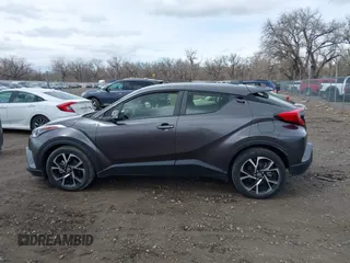 2019 Toyota C-HR XLE with VIN JTNKHMBX6K1055144, listed as a IAAI auction lot 41937836 with 8,299 mi miles. Bid and sale history available at carsss.com. Image 14.
