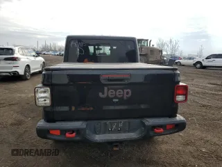 2022 Jeep Gladiator Rubicon with VIN 1C6JJTBG6NL118998, listed as a Copart auction lot 81451814 with 61,125 mi miles and Salvage title. Bid and sale history available at DreamBid. Image 6.