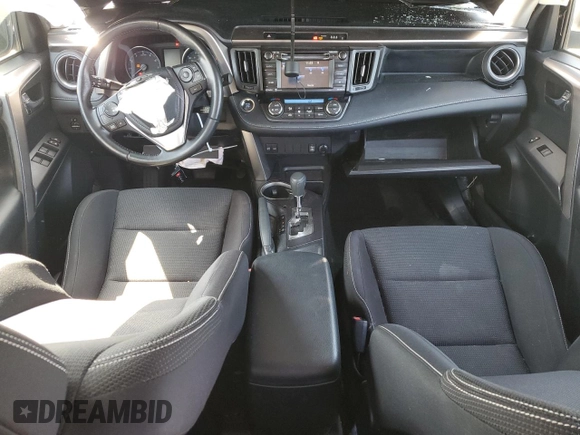 2018 Toyota RAV4 XLE with VIN JTMRFREVXJD251679, listed as a Copart auction lot 49454115 with 48,385 mi miles and Salvage Title. Bid and sale history available at DreamBid. Image 8.