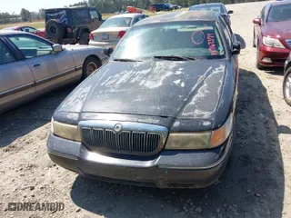 1998 Mercury Grand Marquis LS with VIN 2MEFM75W8WX680422, listed as a IAAI auction lot 41767379 with 1 mi miles. Bid and sale history available at carsss.com. Image 6.