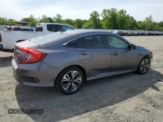 2018 Honda Civic EX-T z VIN 19XFC1F32JE200959, wystawiony jako Copart lot #58049855 z przebiegiem 95 123 mil mil oraz Szkoda całkowita • Salvage title. Historia ofert i sprzedaży dostępna na DreamBid. Obrazek 3.