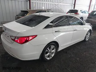 2013 Hyundai Sonata SE with VIN 5NPEC4AC0DH599584, listed as a IAAI auction lot 41961659 with 122,296 mi miles. Bid and sale history available at carsss.com. Image 4.