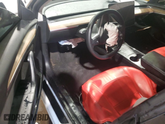 2021 Tesla Model 3 Standard Range Plus with VIN 5YJ3E1EA5MF987000, listed as a Copart auction lot 87638485 with Not Provided miles and Salvage Title. Bid and sale history available at DreamBid. Image 8.