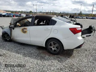 2014 Kia Rio LX with VIN KNADM4A34E6343790, listed as a Copart auction lot 46952313 with Not Provided miles and Non Repairable. Bid and sale history available at DreamBid. Image 2.